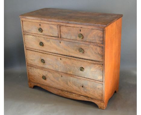 A 19th Century Mahogany Straight Front Chest of two short and three long drawers with circular brass handles raised upon brac