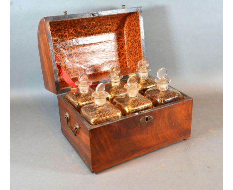 A Regency Mahogany Decanter Box the hinged cover enclosing a fitted interior with six gilded glass decanters with stoppers 27