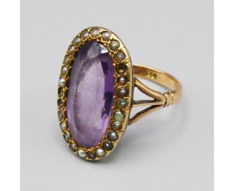 A 9ct Gold Amethyst And Pearl Set Ring Of Oval Form, 6.2 grams, ring size R 