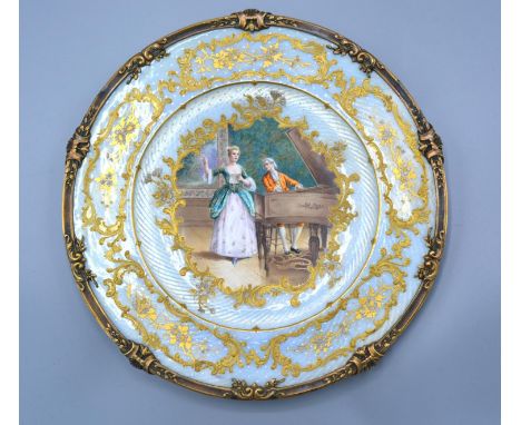 Limoges for Tiffany &amp; Co, A Guilloche and Enamel Cabinet Plate with a central hand-painted reserve depicting figures arou