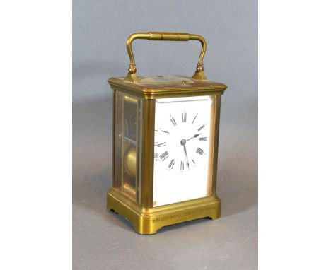 A French Brass Cased Carriage Clock, the repeater movement with lever escapement, the enamel dial with Roman numerals, 13.5 c