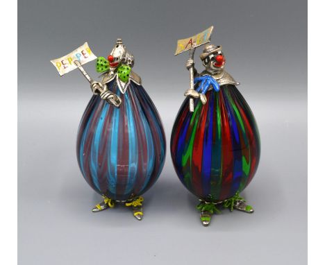 A Pair of Silver Mounted Morano Glass Clowns 'Salt and Pepper' with enamel decorated silver heads and feet and with multicolo