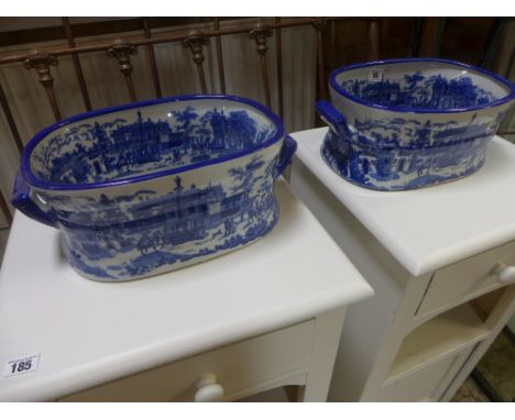 A pair of small ceramic blue and white ironstone style foot bath/planter