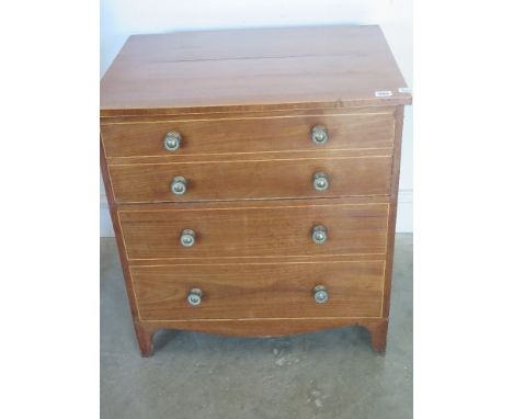 A Georgian mahogany commode in the form of a small chest of drawers 63cm wide x 67cm tall