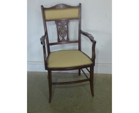 An Edwardian mahogany and inlaid armchair 