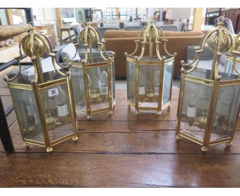 Four modern wall light fittings