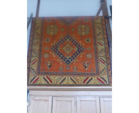 A rust ground handmade Hertiz carpet - 3.05 mx 2.05 m