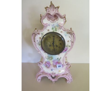 A Royal Bonn China striking mantle clock with a Japy Freres Al movement 44cm tall - not working, pendulum spring broken