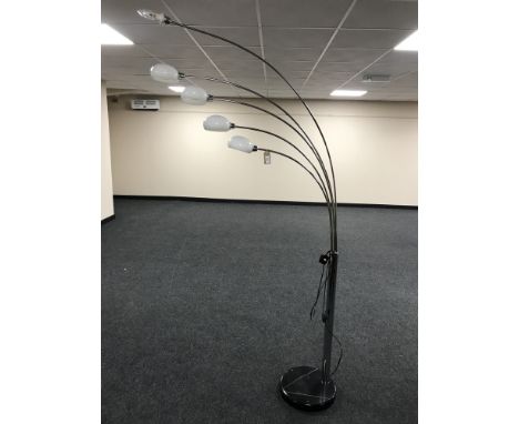 A chrome and marble based five branch floor lamp 