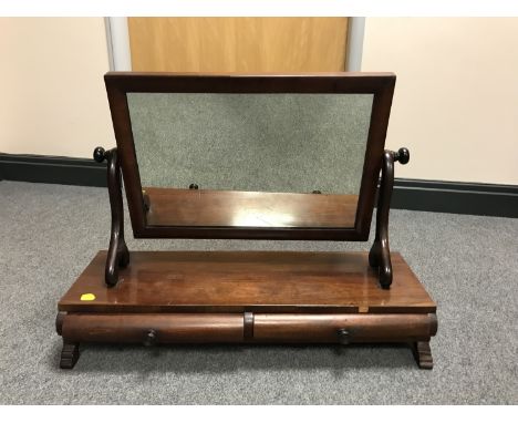 A Victorian mahogany dressing table mirror fitted with two drawers, width 67 cm. 