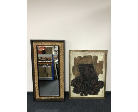 A textured oil mounted on board and an illuminated mirror in cabinet 