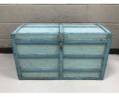 A wooden bound painted trunk 