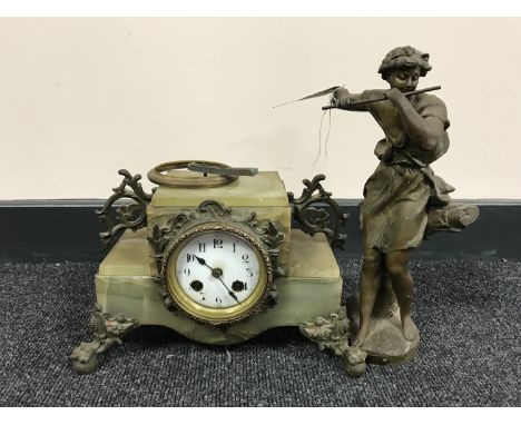 A French onyx and spelter mantel clock 