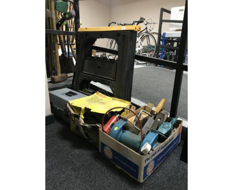 Two folding trestle stands, tool box and tools, box of electric bench grinder, electric sander, bench vice, wood working plan