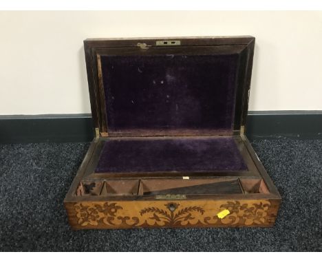A Victorian rosewood brass inlaid writing box  CONDITION REPORT: Brass lifting off in certain places. One inkwell present. Ge