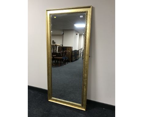 A gilt framed hall mirror 