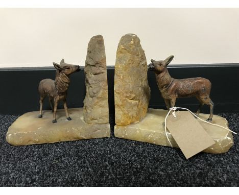 A pair of continental Art Deco deer bookends on marble bases 