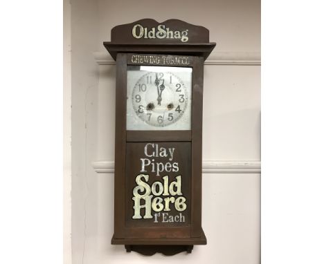 An early 20th century and later eight day wall clock 'Old Shag Tobacco'