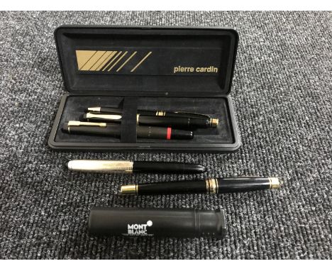 A Pelikan fountain pen, another fountain pen with 14ct gold nib, boxed Pierre Cardin ball-point and fountain pen and another 