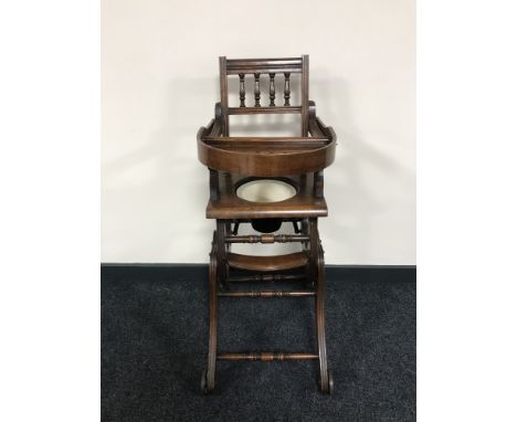 An antique mahogany adjustable child's commode high chair 