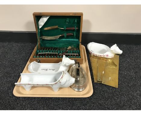 A canteen of teak handled cutlery, brass door plates, plated ash tray with match box holder, three French china dishes 