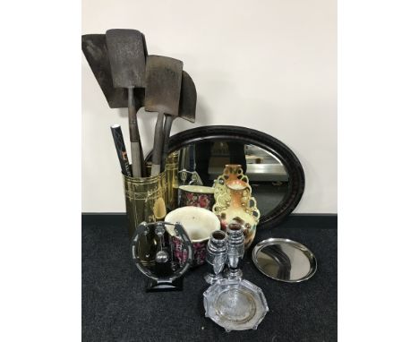 A brass stick pot and four shovels, oval framed mirror, companion set, pair of vases, jardiniere and an hand painted vase