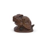 ANTOINE-LOUIS BARYE (FRENCH, 1795-1875), A BRONZE MODEL OF A CROUCHING RABBIT