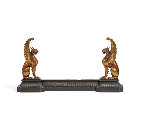 A REGENCY GRIFFIN FENDERIN THE MANNER OF THOMAS HOPE, CIRCA 1815Gilt decorated griffins flanking stiff leaf plinth  the ends 