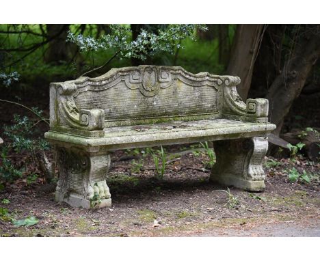 AN ITALIAN CARVED LIMESTONE BENCH MODERN 170.5cm wide, 83cm high, 51cm deep