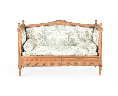 A FRENCH CARVED BEECH AND UPHOLSTERED SOFA IN LOUIS XVI STYLE, LATE 19TH CENTURYUpholstered in Colefax and Fowler toile style