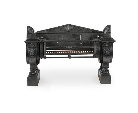 A REGENCY CAST IRON FIRE GRATE IN THE EGYPTIAN CLASSICAL TASTE, FIRST HALF 19TH CENTURYWith triangular backplate with fan lun