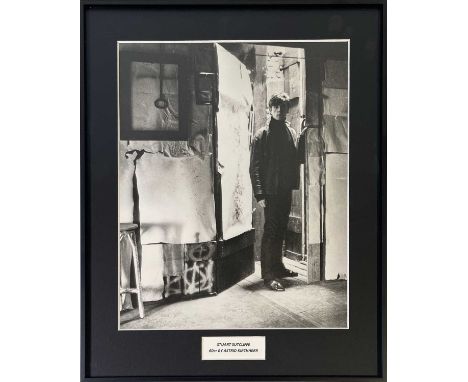 An original vintage print of an image by Astrid Kirchherr depicting Stuart Sutcliffe in Hamburg. Measures 23.5 x 28.9cm. Fram