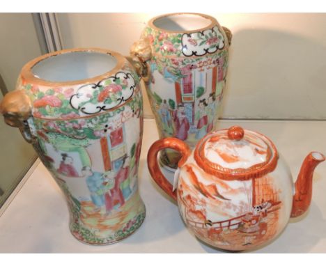 A pair of early 20th Century Cantonese famille rose vases (reduced) together with kutani porcelain teapot