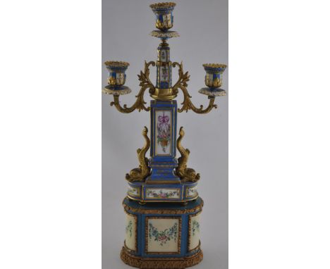 A French 19th Century 3 branch gilt metal candelabra with Sevres style porcelain panels on original giltwood base, H50cm.