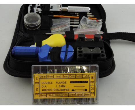 A comprehensive pouched watchmaker's tool kit, together with in excess of 400 strap pins