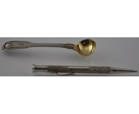 Early Victorian silver mustard spoon engraved with heraldic emblem, together with a silver propelling pencil with engine-turn