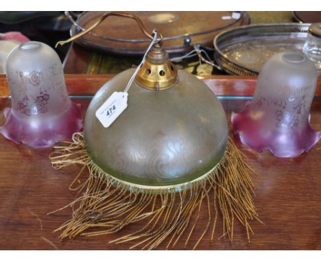 An early 20th century etched green glass light together with two Victorian edged glass shades. 