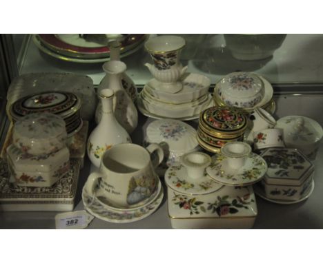 A collection of 39 pieces of Wedgwood cermics including trinket boxes, pin trays, dwarf candlesticks etc