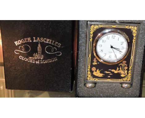 A Roger Lascelles miniature carriage clock, boxed. H. 6.5cm