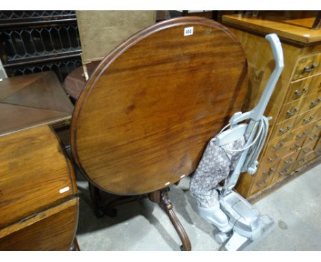 A 19th Century Mahogany Circular Topped Tilt Tripod Table                       