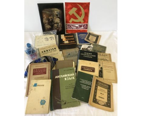 A box of assorted Russia Interest ephemera and items. To include books, newspapers, glass tumbler and weighing scales. 
