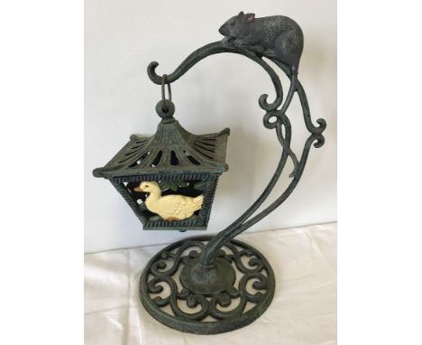 A cast iron hanging tea light holder garden ornament. With farm animal decoration to lantern. Approx. 31cm tall.