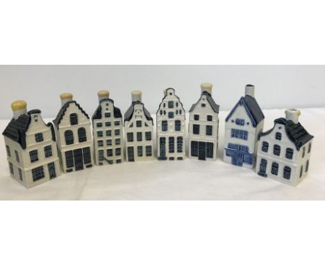 A collection of 8 Blue Delft KLM BOLS ceramic miniature houses to include c1950's example. Made as free gifts for 1st class p