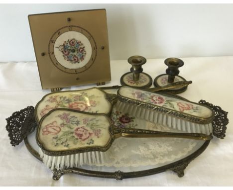 A vintage ladies dressing table set with embroidered detail. Comprising; glass topped tray (a/f), 2 brushes, hand mirror, clo