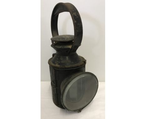 A vintage British Rail 3 aspect hand signal oil lamp with bevel edged glass. Marked to side B.R. Approx. 31cm tall.
