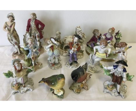 A collection of small ceramic figurines and ornaments. To include Beswick birds and Capodimonte figurines. Tallest approx. 16