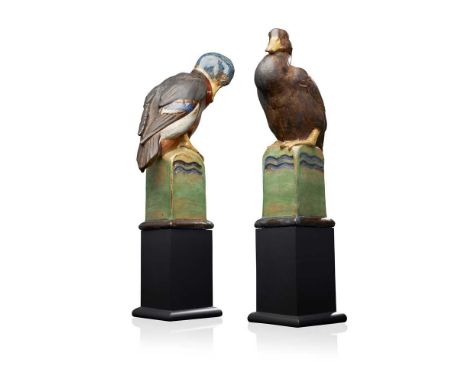 Modelled as a duck and a drake, glazed in green, blue, mauve and umber, one with moulded signature to base 'GILBERT BAYES', b