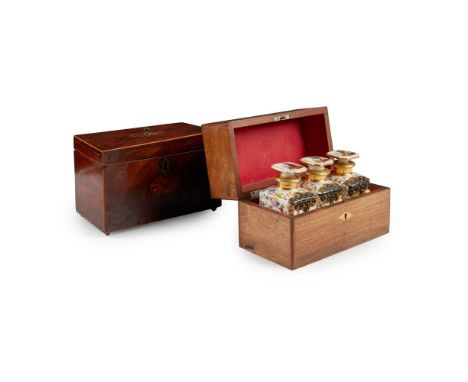 The hinged top enclosing three painted porcelain caddies; together with a George III mahogany tea caddyeach 23cm wideFootnote