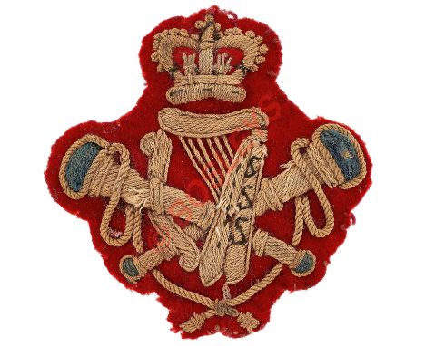 British Army Victorian bandsman's scarce arm badge.Heavily white embroidered crowned crossed trumpets with blue bell ends, ha