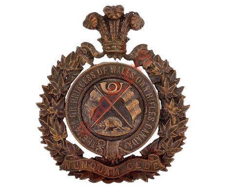 Canadian 14th Bn. (Princess of Wales Own Rifles)  Militia helmet plate.A good scare die-stamped blackened brass example. Mapl